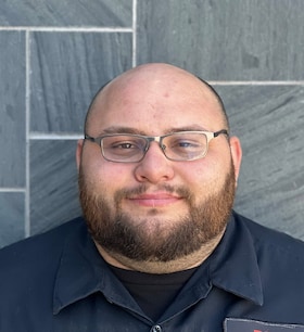 Staff member Casy White from ID_6a1680