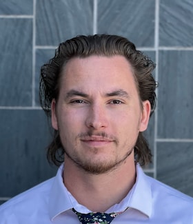 Staff member Bastian Mckay from ID_ee6c23