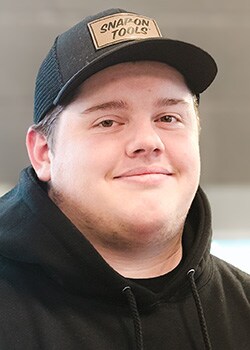 Staff member Landon Goodman from ID_478351