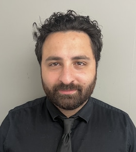 Staff member Mustapha Samadi from 12a9eda9dd2c