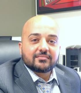 Staff member Faisal Zalmy from 12a9eda9dd2c