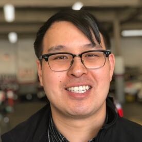 Staff member Kevin Goh from ID_738982