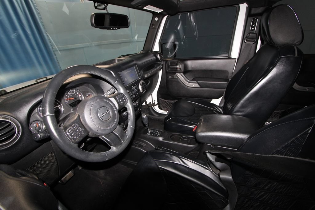 Used 2015 Jeep Wrangler Unlimited Sport with VIN 1C4BJWDG7FL742256 for sale in Boonville, IN