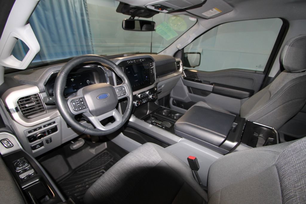 Used 2023 Ford F-150 Lightning XLT with VIN 1FT6W1EV0PWG37111 for sale in Evansville, IN