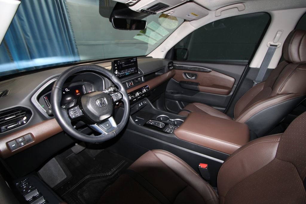 Used 2023 Honda Pilot Elite with VIN 5FNYG1H85PB025048 for sale in Evansville, IN