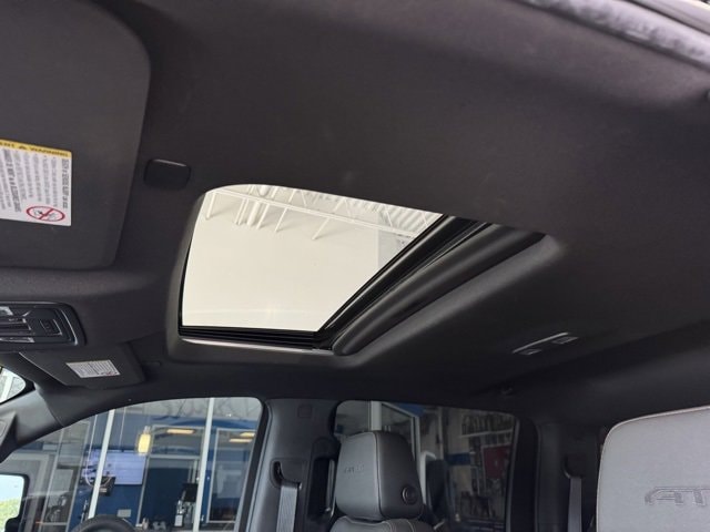 Used 2022 GMC Sierra 2500HD AT4 with VIN 1GT49PEYXNF334894 for sale in Peotone, IL