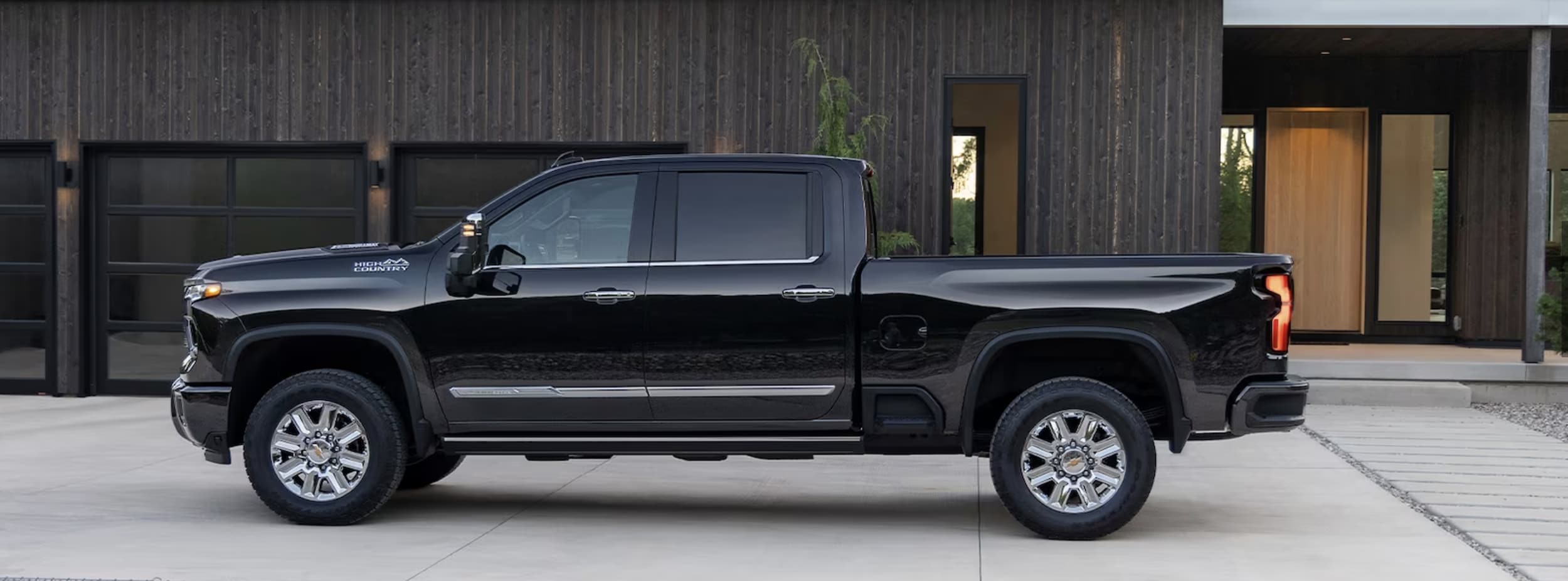 2024 Chevrolet Silverado 2500 HD parked in front of house