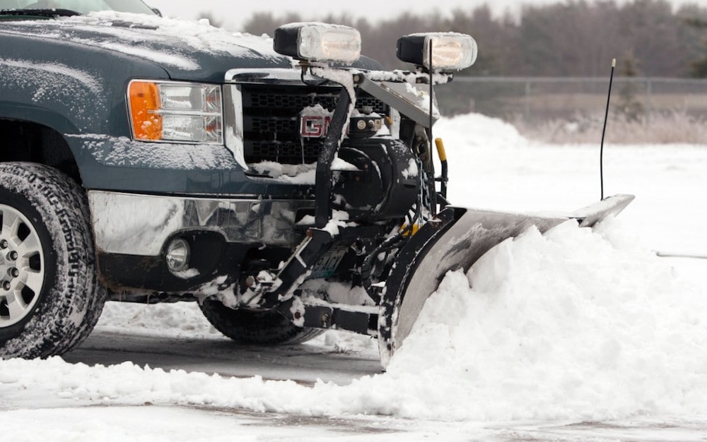 GMC Truck Plowing Snow