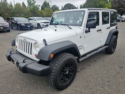 2013 Jeep Wrangler Unlimited Sport SUV 4D Manual 6-Spd SUV