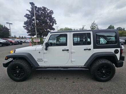 2013 Jeep Wrangler Unlimited Sport SUV 4D Manual 6-Spd SUV