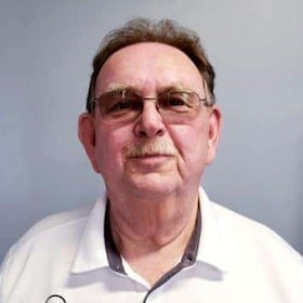 Staff member Rex McDonald from ID_011802