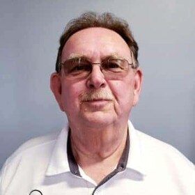 Staff member Rex McDonald from ID_293854
