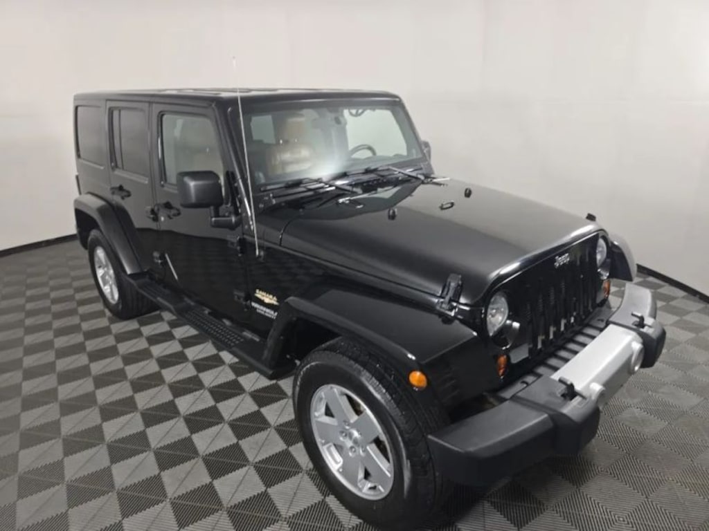 Used 2012 Jeep Wrangler Unlimited Sahara Sport Utility 4D SUV