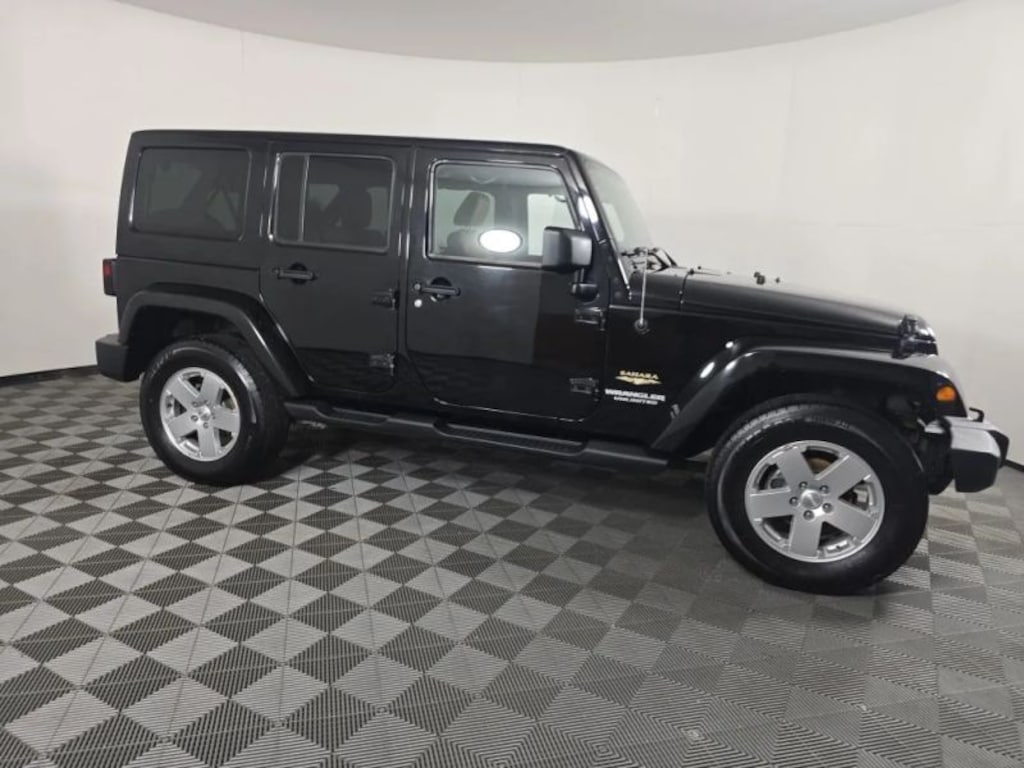 Used 2012 Jeep Wrangler Unlimited Sahara Sport Utility 4D SUV