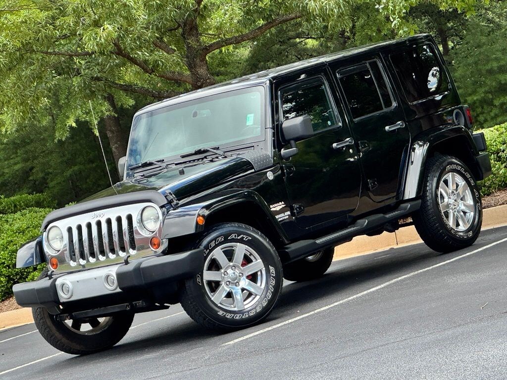 Used 2013 Jeep Wrangler Unlimited Sahara SUV