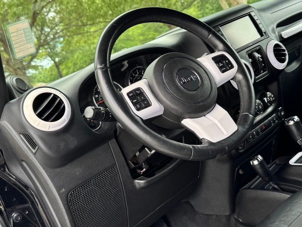 Used 2013 Jeep Wrangler Unlimited Sahara SUV
