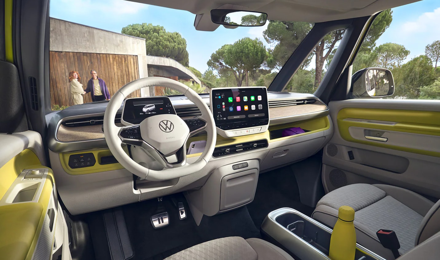 Interior view of the Volkswagen ID.BUZZ featuring the modern dashboard with advanced controls and a spacious layout.