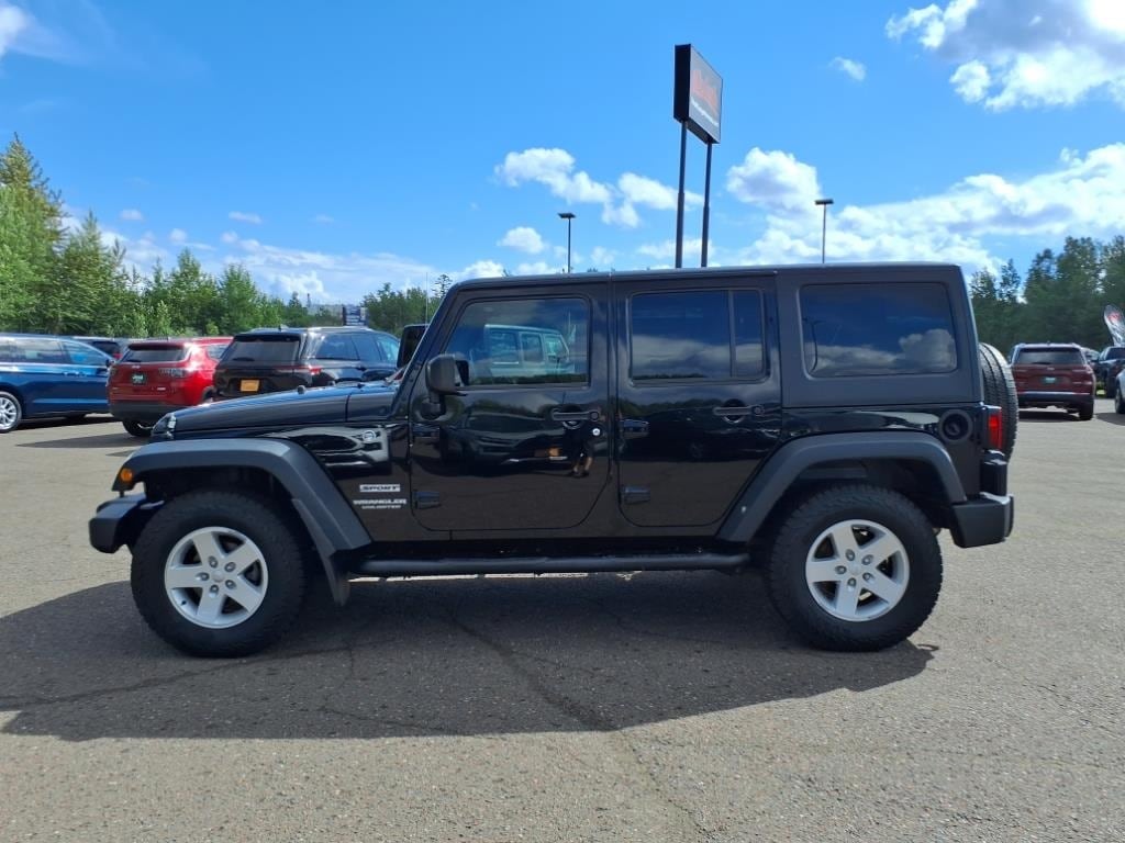 Used 2017 Jeep Wrangler Unlimited Sport with VIN 1C4BJWDG5HL521211 for sale in Hermantown, Minnesota