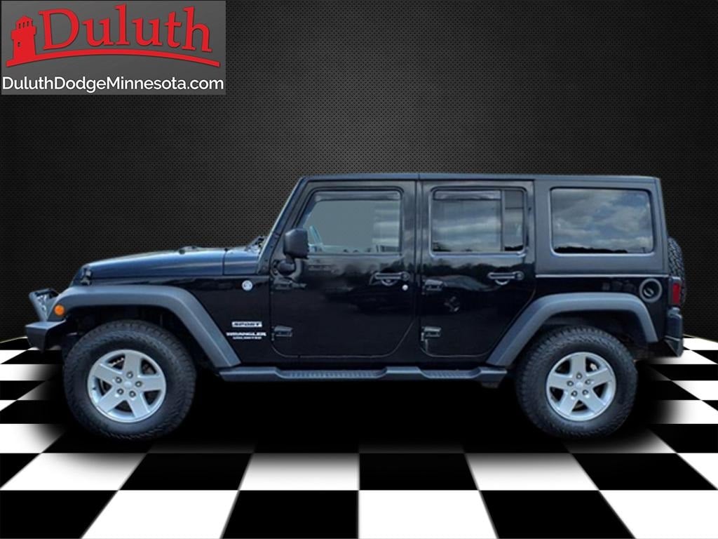 Used 2015 Jeep Wrangler Unlimited Sport with VIN 1C4BJWDG1FL544823 for sale in Duluth, Minnesota