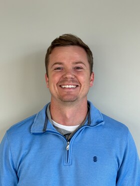 Staff member Greg Strausz from a65c29efbde6