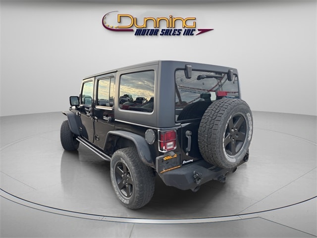 Used 2016 Jeep Wrangler Unlimited Black Bear with VIN 1C4BJWDG8GL130701 for sale in Cambridge, OH