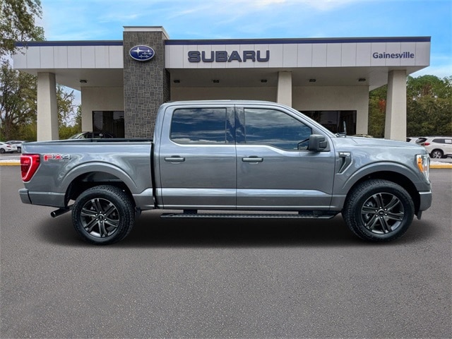 Used 2022 Ford F-150 XLT with VIN 1FTFW1E81NKD34613 for sale in Gainesville, FL