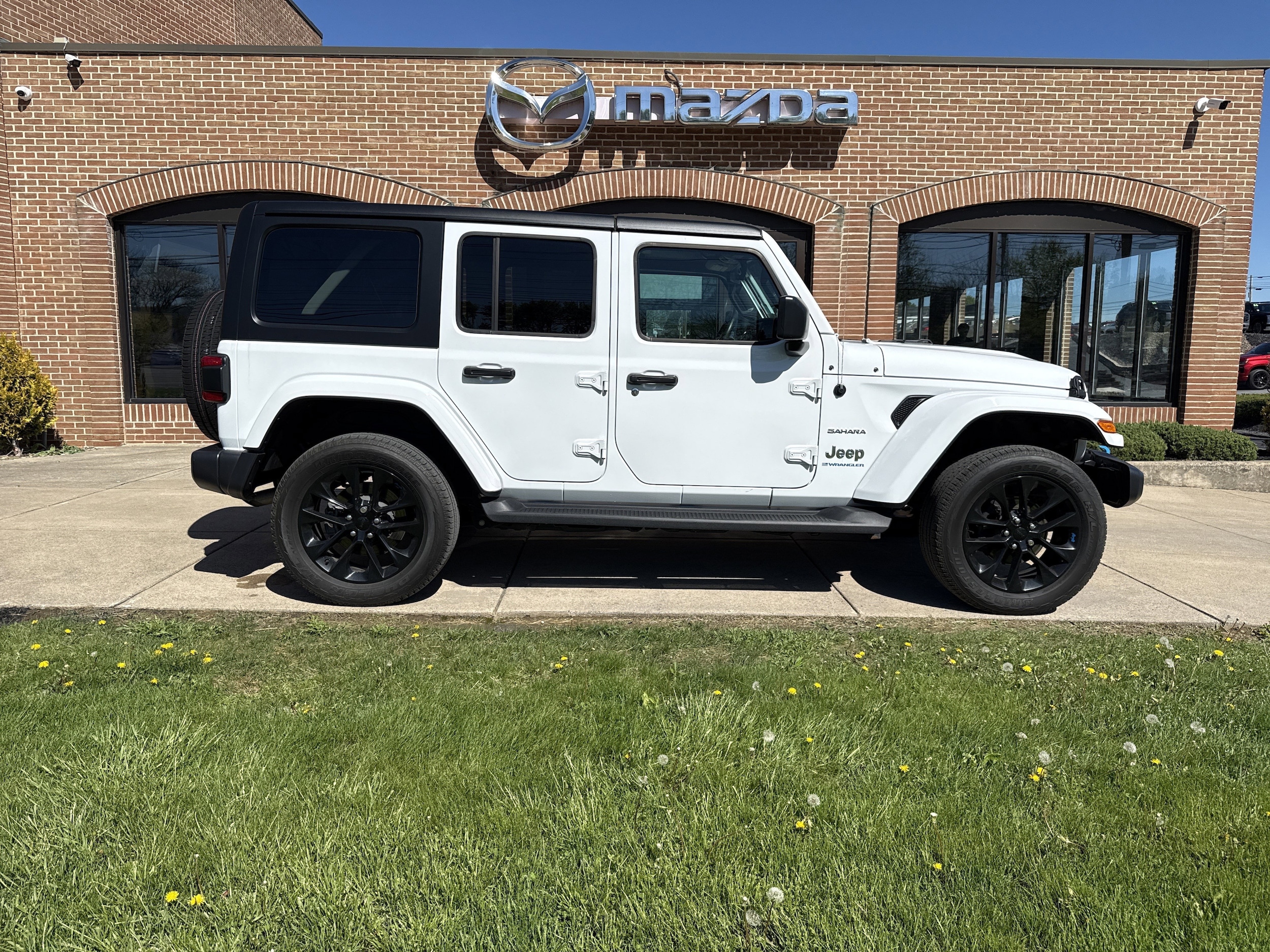 Used 2023 Jeep Wrangler 4xe Sahara 4XE with VIN 1C4JJXP65PW581149 for sale in State College, PA