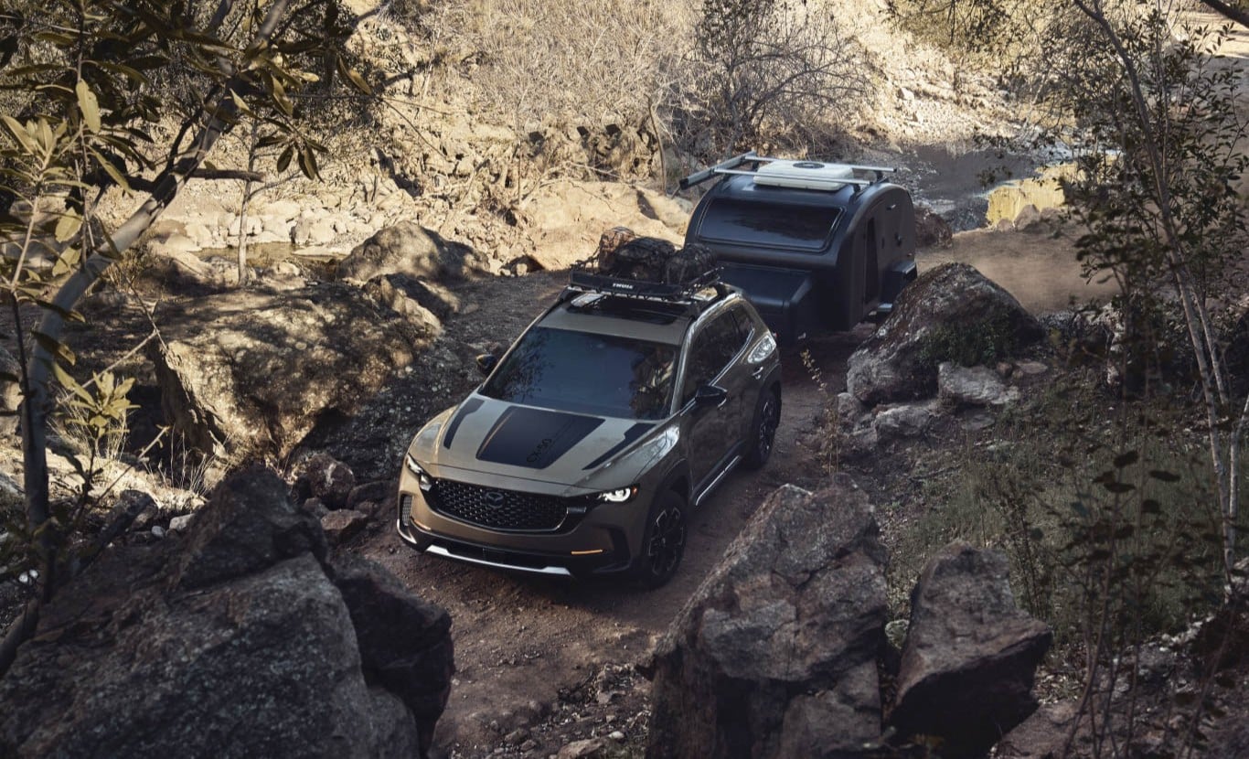 2026 Mazda CX-50 towing a camper