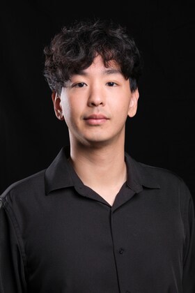 Staff member Johnny Zheng from ID_f2b7227e22f0