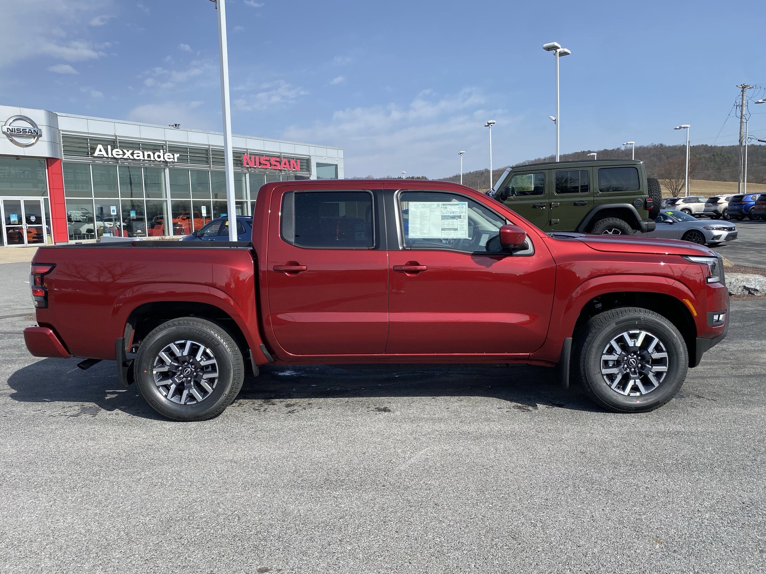 2025 Nissan Frontier SL photo 2
