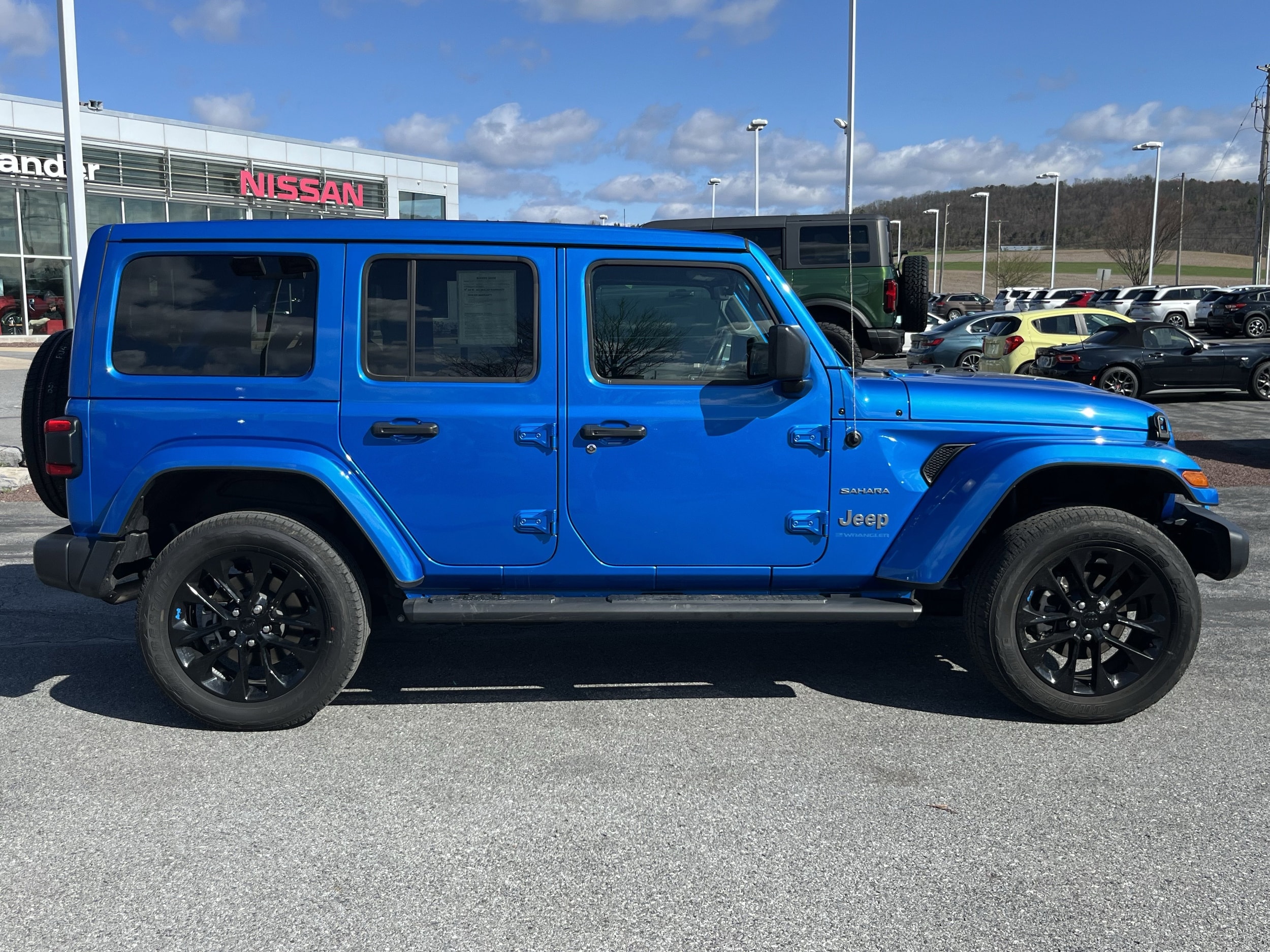 Used 2023 Jeep Wrangler 4xe Sahara 4XE with VIN 1C4JJXP69PW568128 for sale in Montoursville, PA