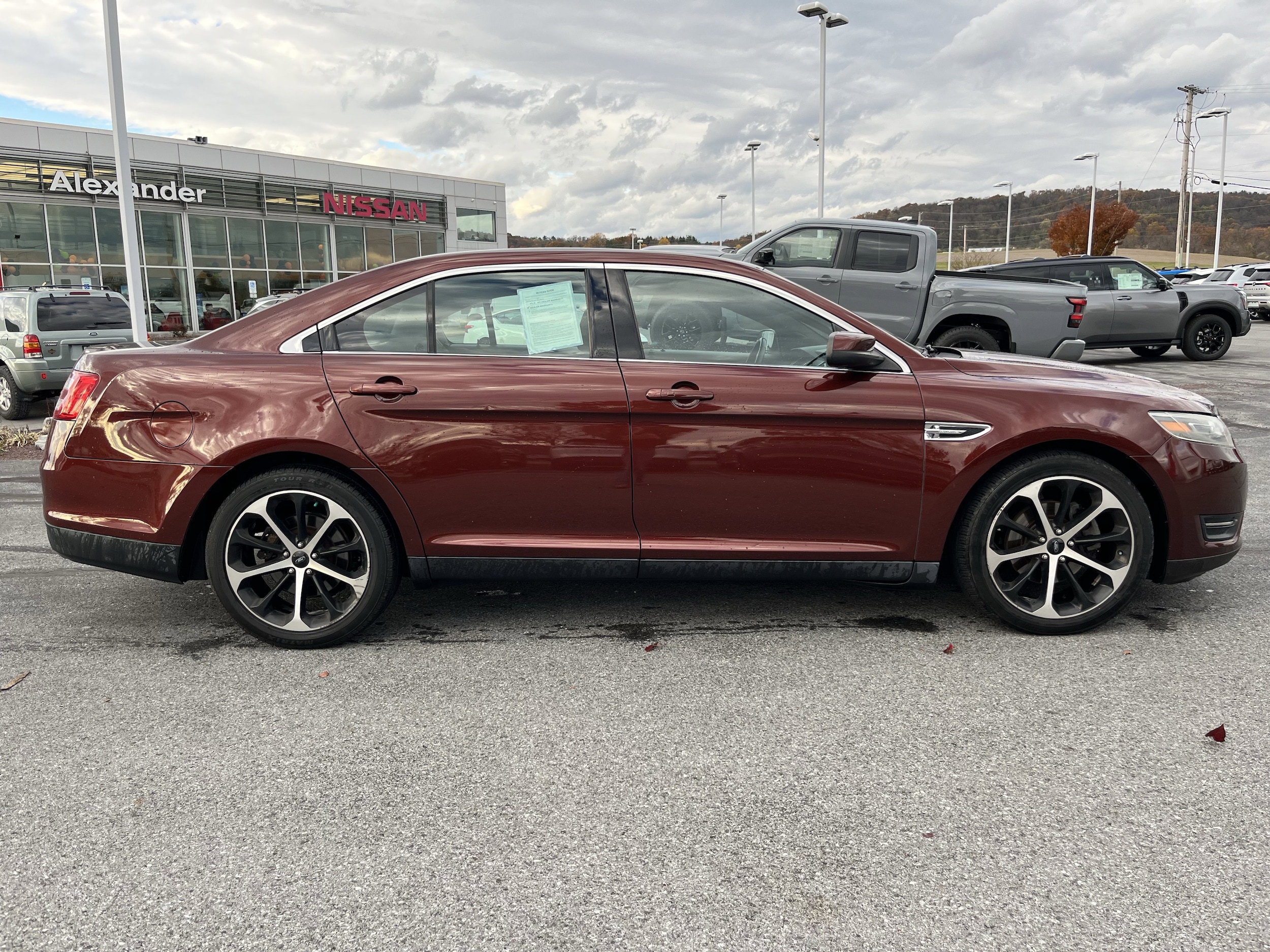 Used 2015 Ford Taurus SEL with VIN 1FAHP2E82FG120624 for sale in Montoursville, PA