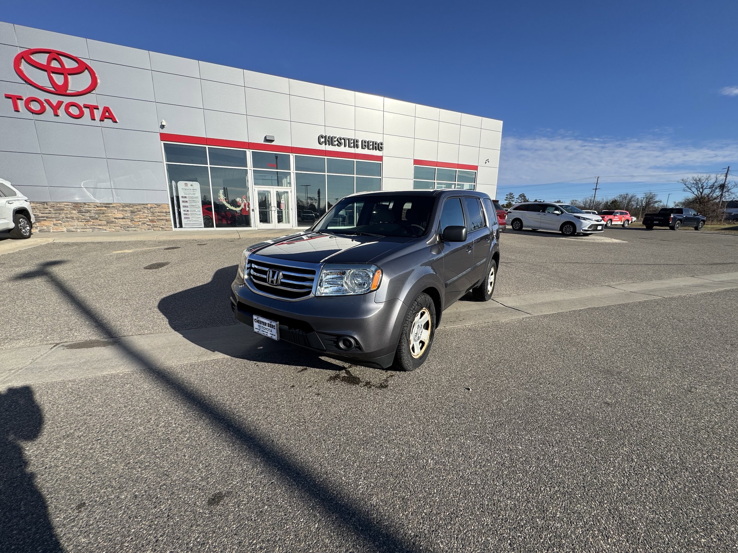 Used 2014 Honda Pilot LX with VIN 5FNYF4H29EB040262 for sale in Bemidji, Minnesota