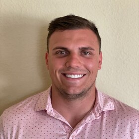 Staff member TJ Hudler from 165cfbd800d4
