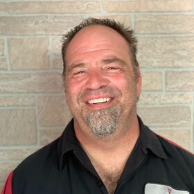 Staff member Tom Manning from ad86eb257e3f