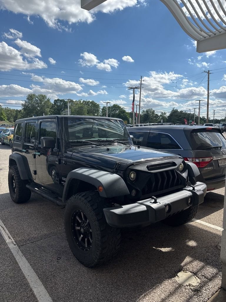 Used 2017 Jeep Wrangler Unlimited Sport with VIN 1C4BJWDG6HL665219 for sale in Evansville, IN
