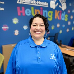 Staff member Syedah Belletti from ID_4e13c5212771