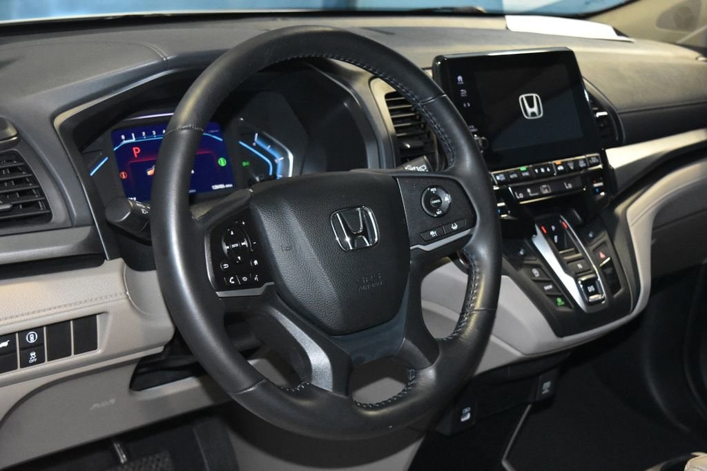 Used 2021 Honda Odyssey EX-L with VIN 5FNRL6H71MB010059 for sale in Evansville, IN