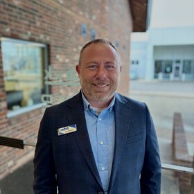Staff member Aric Mitchell from ID_f40fe9c186fe
