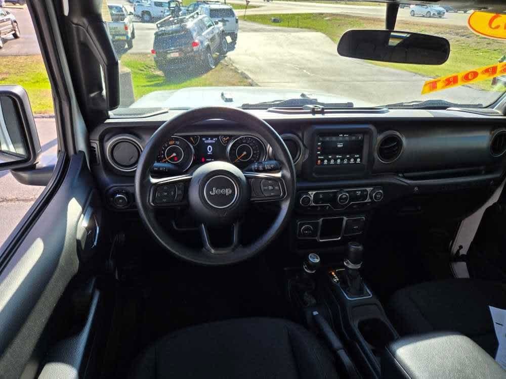Used 2023 Jeep Wrangler 4-Door Sport with VIN 1C4HJXDG0PW668128 for sale in Pekin, IL