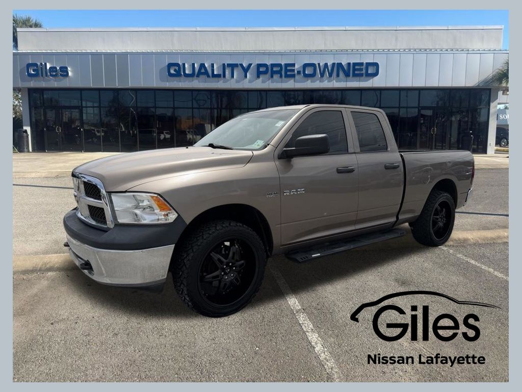 Brown (Austin Tan Pearlcoat Light Graystone Pearlcoat) 2010 Dodge RAM 1500 ST Quad Cab RWD Pickup Truck 4X2 5-Speed Automatic