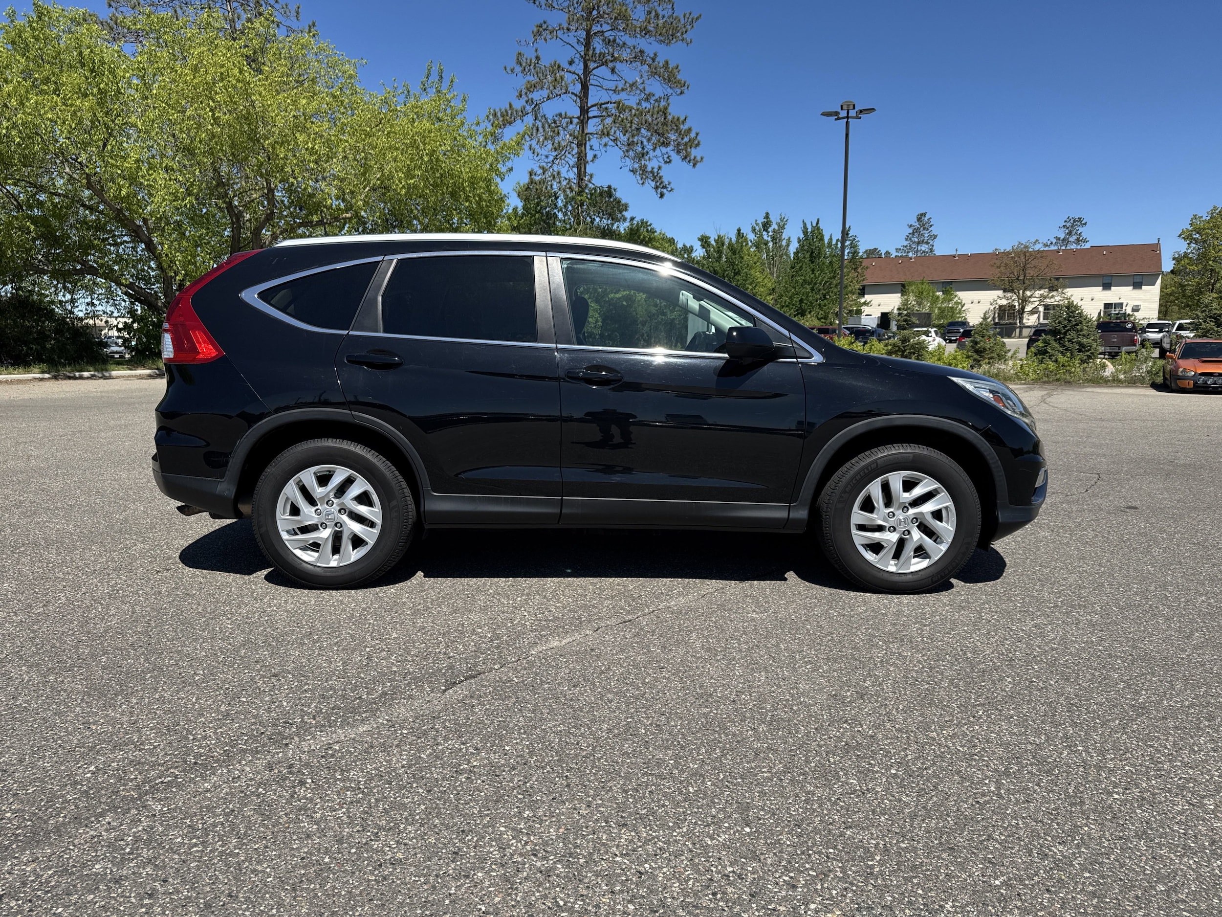 Used 2015 Honda CR-V EX-L with VIN 5J6RM4H70FL059989 for sale in Bemidji, Minnesota