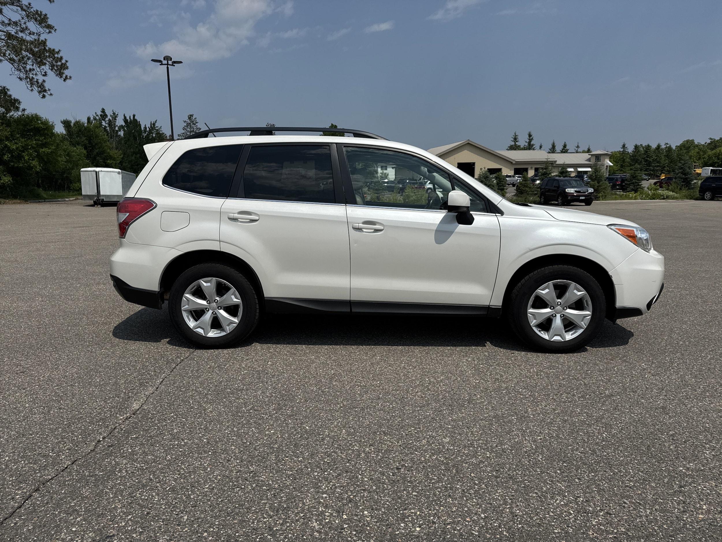 Used 2015 Subaru Forester i Limited with VIN JF2SJARC4FH450691 for sale in Bemidji, Minnesota