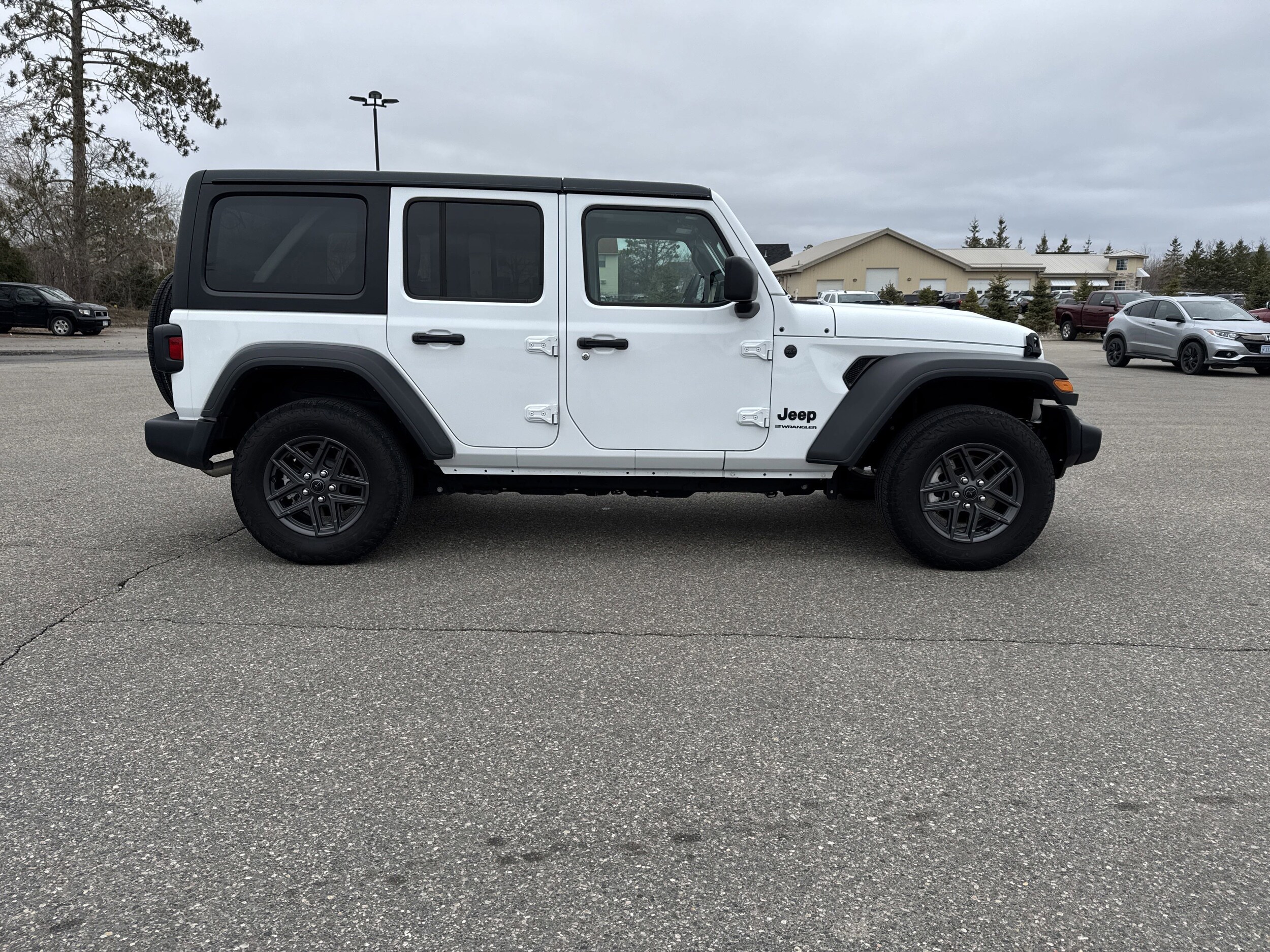2024 Jeep Wrangler Sport photo 2