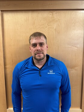 Staff member Jordan Bredell from ID_c48110ccd064