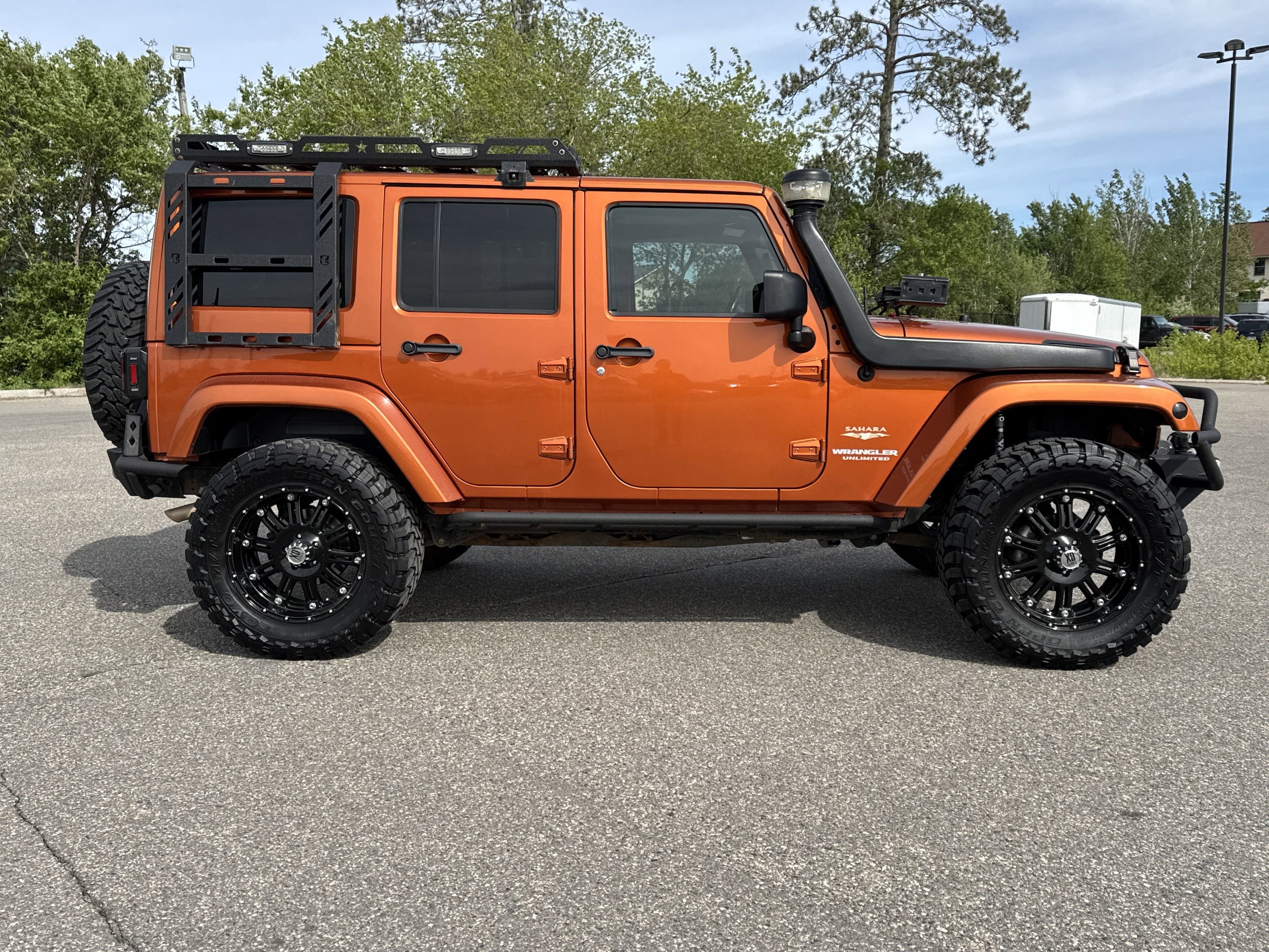 Used 2011 Jeep Wrangler Unlimited Sahara with VIN 1J4HA5H19BL598322 for sale in Bemidji, Minnesota