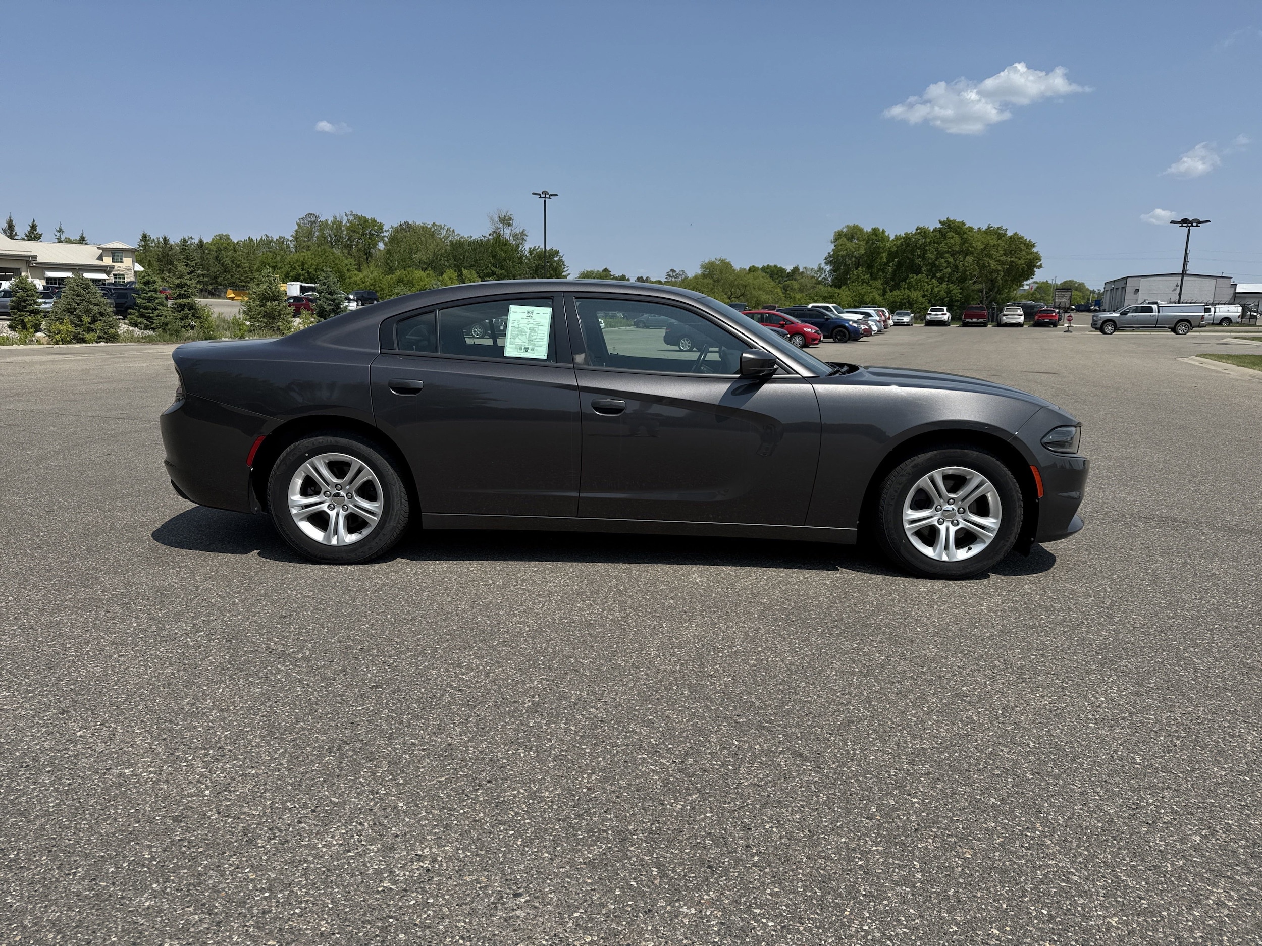 Used 2021 Dodge Charger SXT with VIN 2C3CDXBG3MH518467 for sale in Bemidji, Minnesota