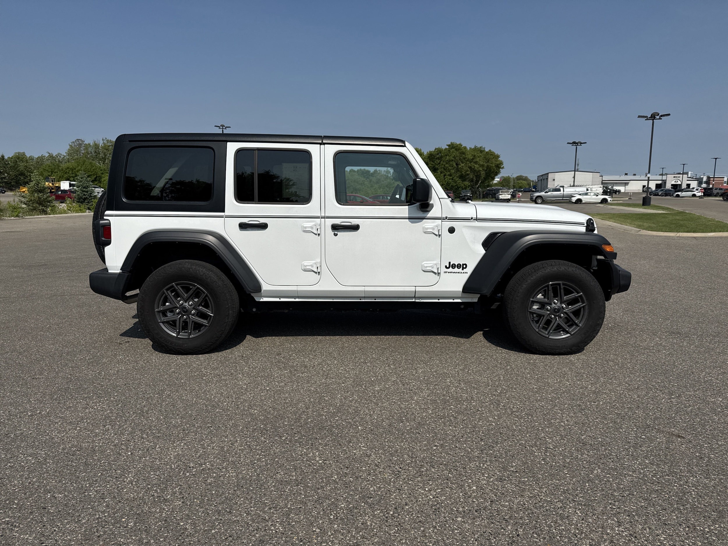 Used 2024 Jeep Wrangler 4-Door Sport S with VIN 1C4PJXDN4RW239278 for sale in Bemidji, Minnesota