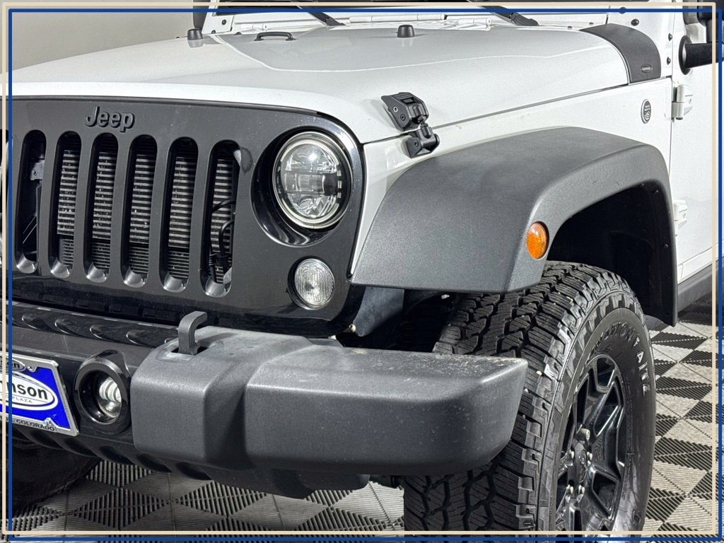 Used 2017 Jeep Wrangler Unlimited Willys Wheeler with VIN 1C4BJWDGXHL537677 for sale in Brighton, CO