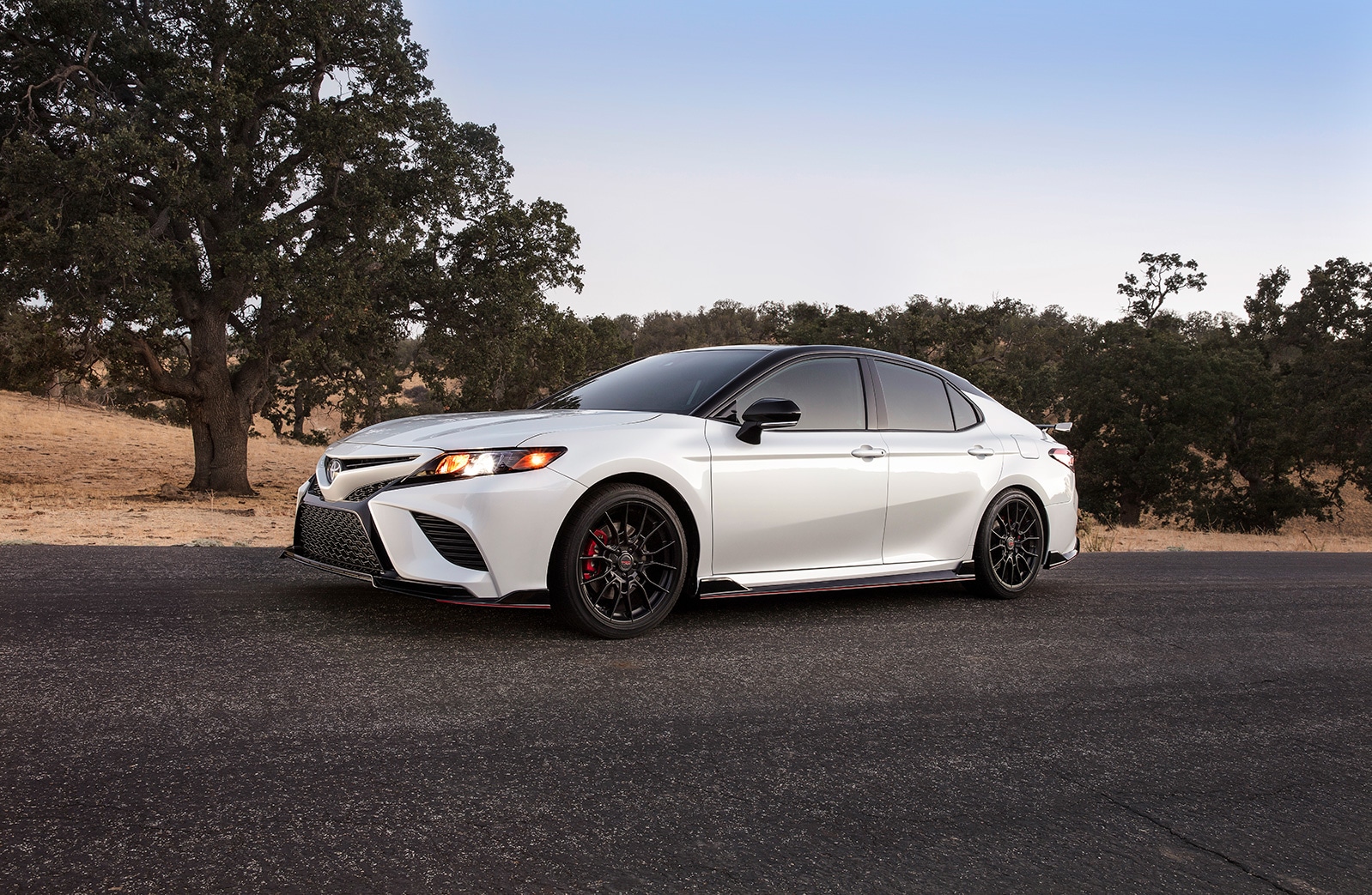 Model Features of the 2020 Toyota Camry at Johnstons Toyota of New Hampton | side profile of the 2020 camry